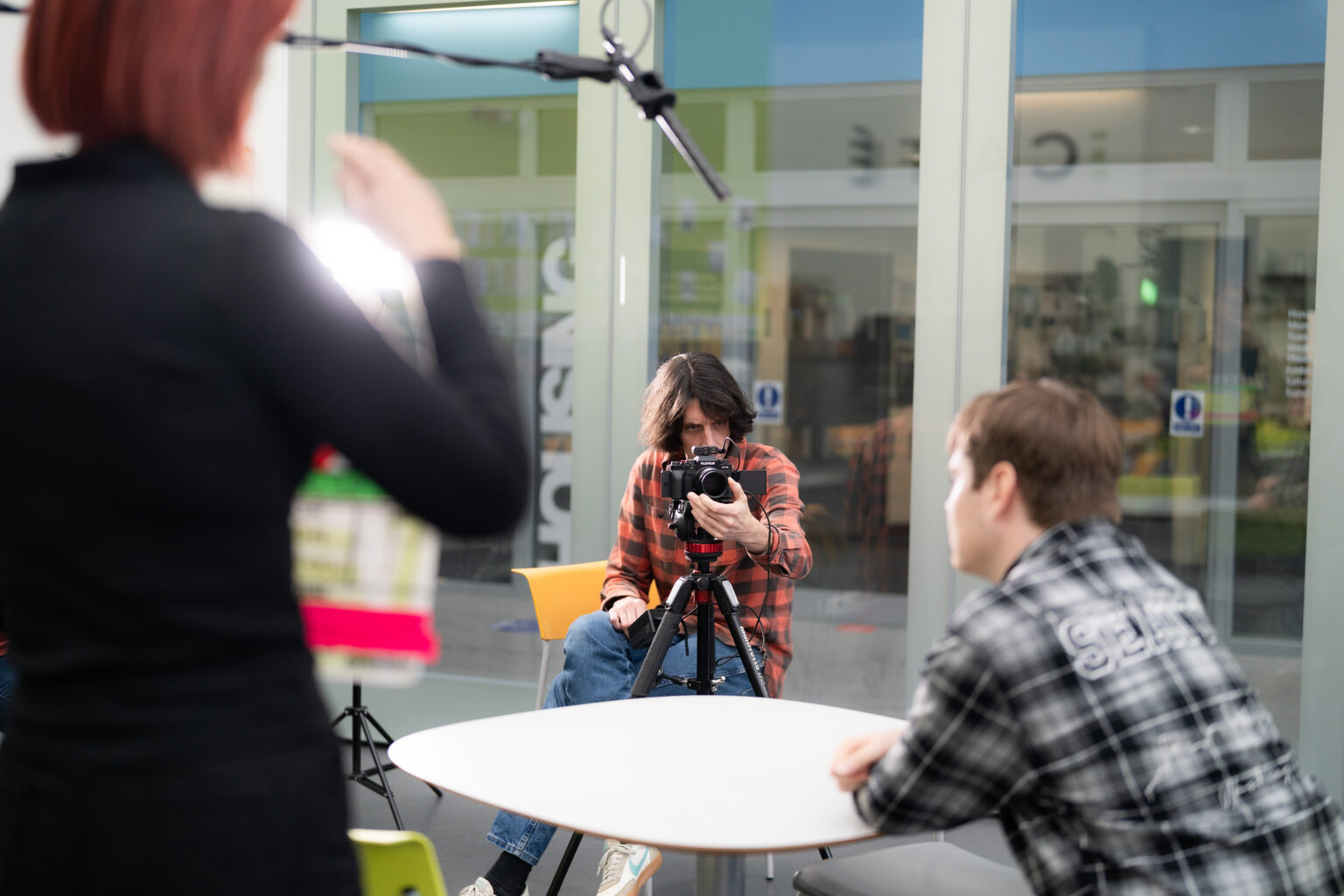 camera man shooting an interview