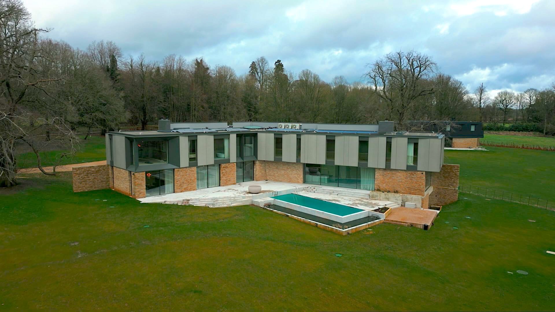 luxury home with land surrounding